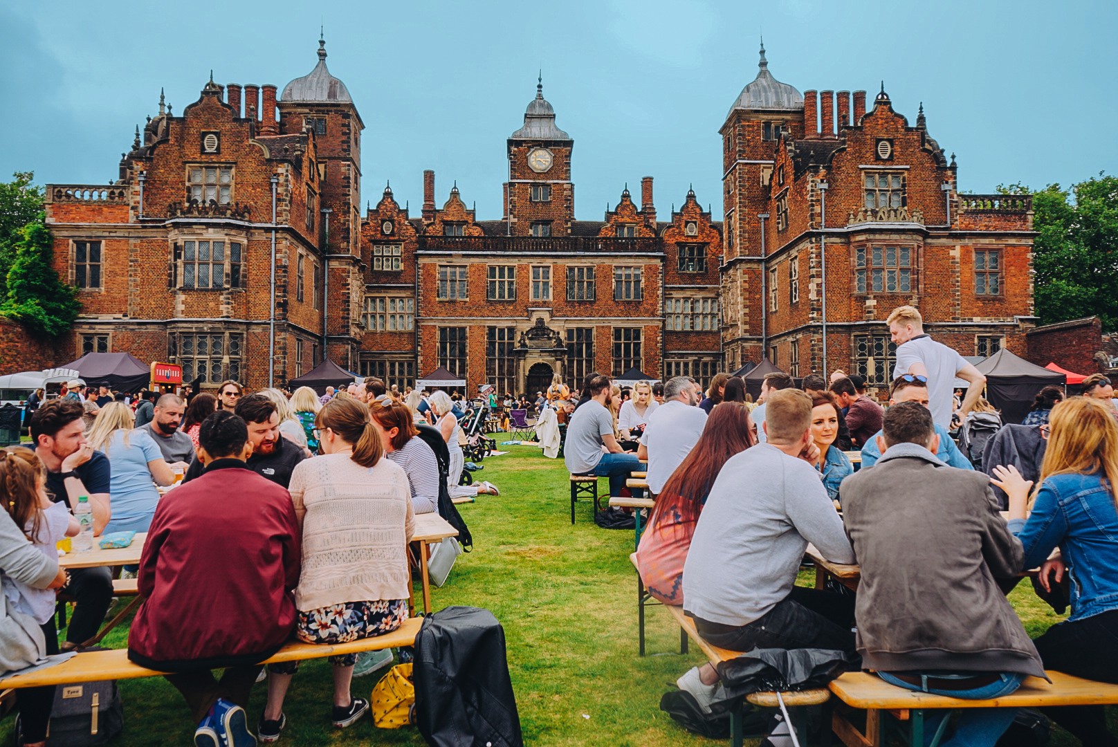 Lifestyle shot of people enjoying themselves in a pub garden
